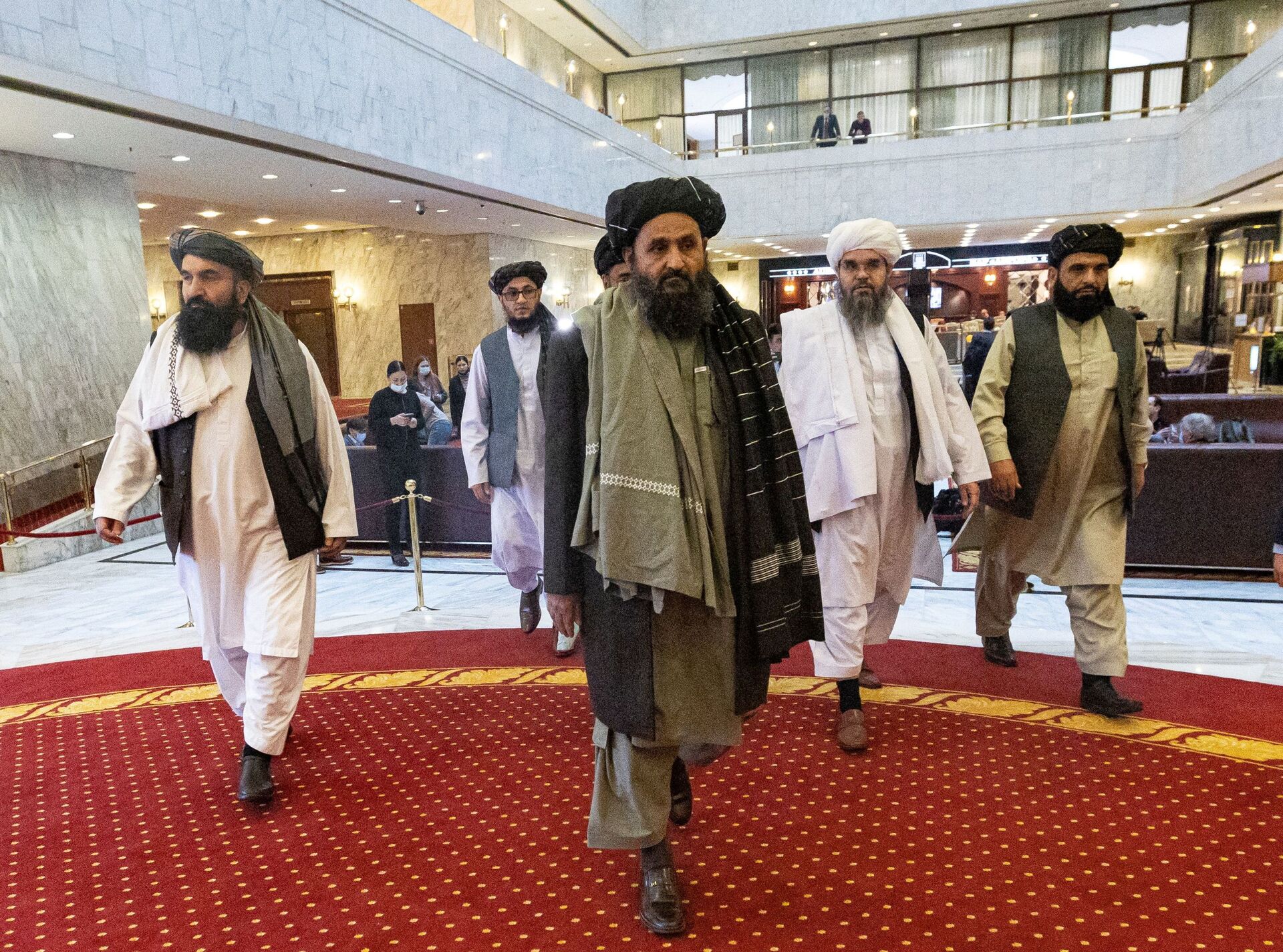 Mullah Abdul Ghani Baradar, the Taliban's deputy leader and negotiator, and other delegation members attend the Afghan peace conference in Moscow, Russia March 18, 2021. - Sputnik International, 1920, 07.09.2021
