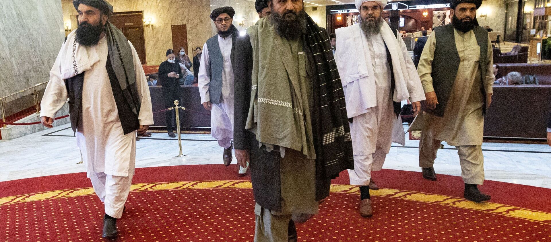 Mullah Abdul Ghani Baradar, the Taliban's deputy leader and negotiator, and other delegation members attend the Afghan peace conference in Moscow, Russia March 18, 2021. - Sputnik International, 1920, 20.06.2021