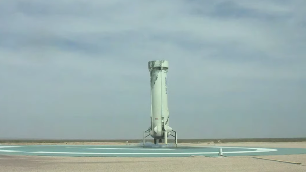 Blue Origin's New Shepard launch vehicle after performing a soft landing during a launch test on April 14, 2021 - Sputnik International