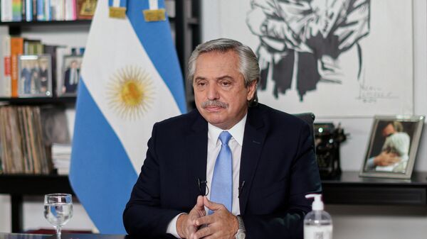 Handout picture released by Argentina's Presidency showing Argentine President Alberto Fernandez announcing new measures against the spread of the novel coronavirus, COVID-19, from Olivos Presidential Residence in Olivos, Buenos Aires, on April 14, 2021. - Sputnik International