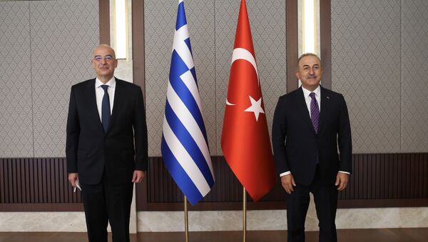 Turkish Foreign Minister Mevlut Cavusoglu meets with his Greek counterpart Nikos Dendias in Ankara, Turkey April 15, 2021. - Sputnik International