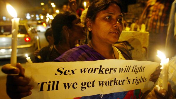 Activists of the Darbar Mahila Samanwaya Committee, a forum of 65,000 sex workers based in West Bengal, publicize a rally scheduled for March 8, at a red light area in New Delhi, India, Friday, March 3, 2006 - Sputnik International