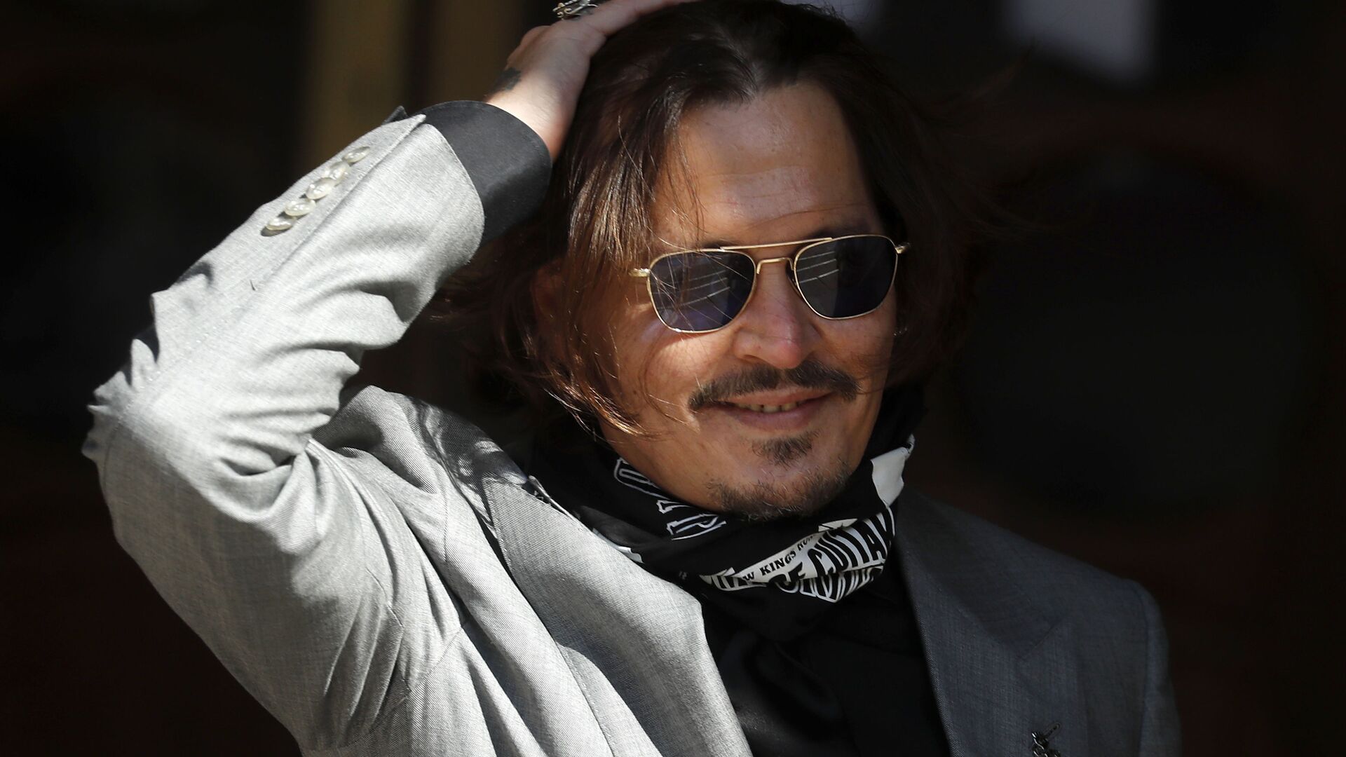 In this file photo dated Tuesday, July 28, 2020, US Actor Johnny Depp arrives at the High Court in London during his case against News Group Newspapers over a story published about his former wife Amber Heard, which branded him a 'wife beater' - Sputnik International, 1920, 03.05.2022