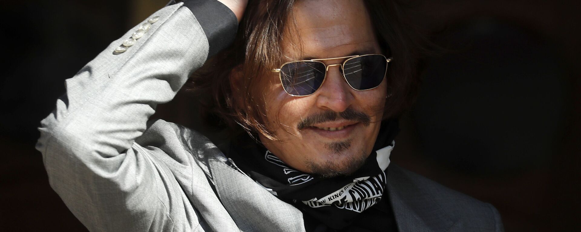 In this file photo dated Tuesday, July 28, 2020, US Actor Johnny Depp arrives at the High Court in London during his case against News Group Newspapers over a story published about his former wife Amber Heard, which branded him a 'wife beater' - Sputnik International, 1920, 05.06.2022