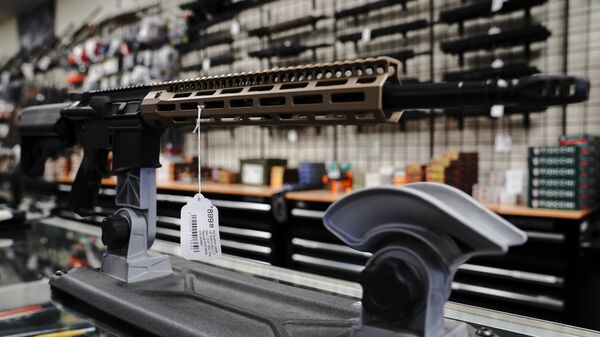 An FU custom upper receiver for an AR-15 style rifle is displayed for sale at Firearms Unknown, a gun store in Oceanside, California, U.S., April 12, 2021.  REUTERS/Bing Guan - Sputnik International