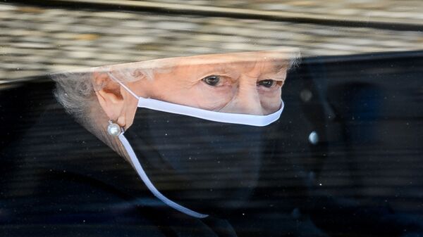 Britain's Queen Elizabeth II arrives for the funeral of Britain's Prince Philip, who died at the age of 99, at St George's Chapel, in Windsor, Britain, April 17, 2021. - Sputnik International