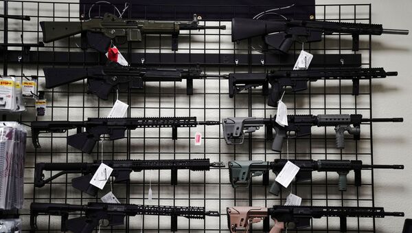 FILE PHOTO: AR-15 style rifles are displayed for sale at Firearms Unknown, a gun store in Oceanside, California, U.S., April 12, 2021. REUTERS/Bing Guan/File Photo - Sputnik International