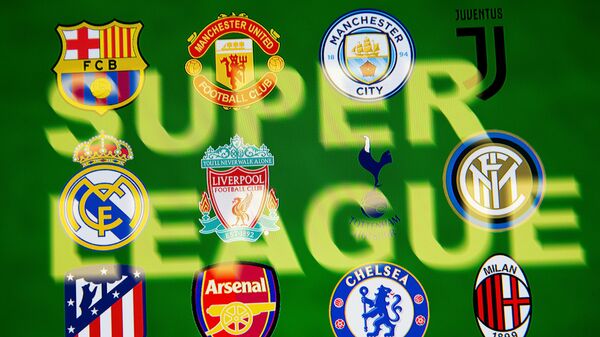 Super League words are seen in front of twelve of Europe's top football clubs logos in this illustration taken April 19, 2021 - Sputnik International