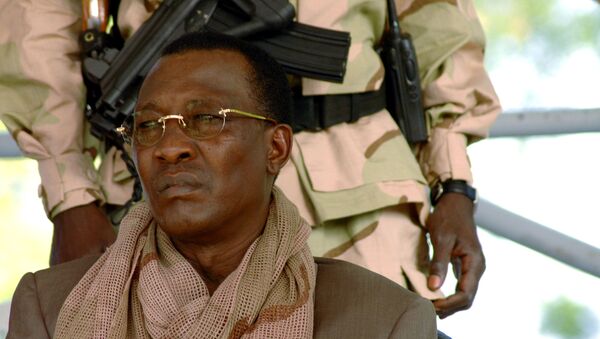 FILE PHOTO: Chad President Idriss Deby watches a rally in N'Djamena April 15, 2006. Deby's supporters paraded victoriously through the streets of the capital N'Djamena on Saturday but many nervous residents feared rebels fighting to topple him may return.  - Sputnik International