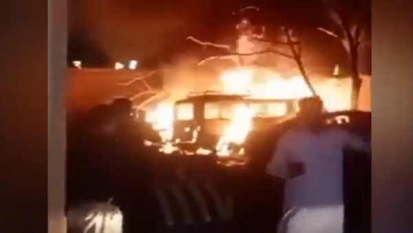 A screenshot from a video showing the aftermath of a blast that hit a parking lot at the Serena hotel in Pakistan - Sputnik International