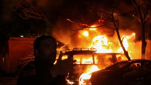 A police officer reacts after an explosion at a luxury hotel in Quetta, Pakistan April 21, 2021 - Sputnik International