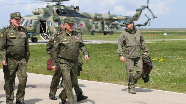 Russian Defence Minister Sergei Shoigu during military drills in Crimea, 22 April 2021 - Sputnik International