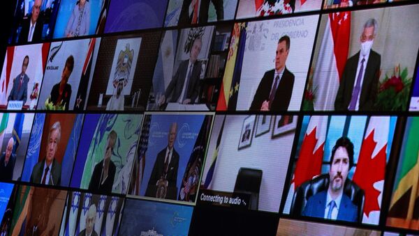 World leaders appear on screen during a virtual Climate Summit, seen from the East Room at the White House in Washington, US, 22 April 2021. - Sputnik International
