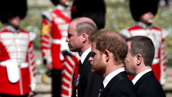 Britain's Prince William and Britain's Prince Harry follow the coffin of Britain's Prince Philip, as it passes through the Parade Ground, during his funeral at Windsor Castle, Britain, 17 April 2021 - Sputnik International