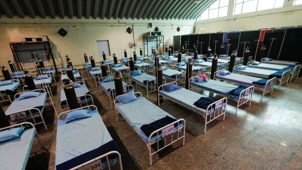 Beds with oxygen support are seen at a recently constructed quarantine facility for patients diagnosed with the coronavirus disease (COVID-19), in Mumbai, India, April 13, 2021 - Sputnik International