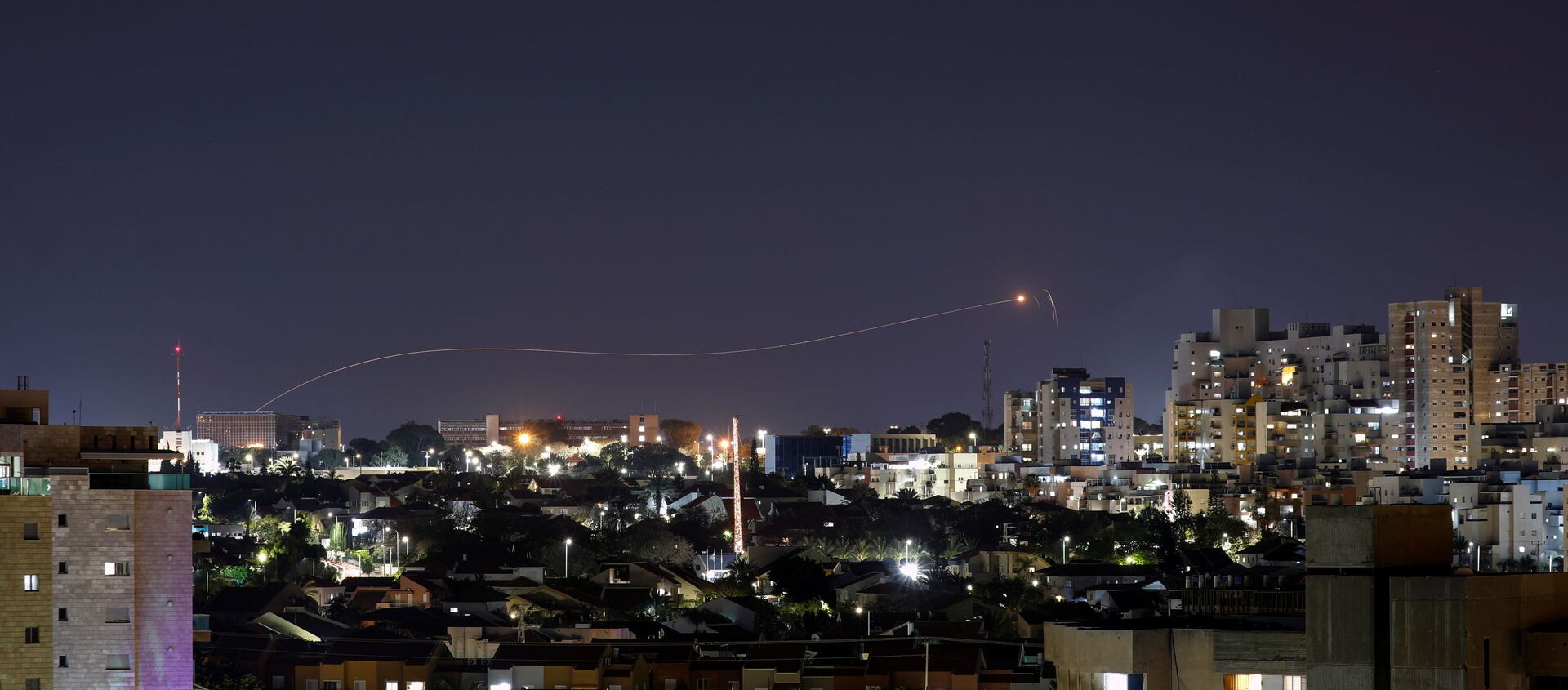 Iron Dome anti-missile system fires an interceptor missile as a rocket is launched from Gaza towards Israel, as seen from the city of Ashkelon, Israel April 24, 2021. - Sputnik International, 1920, 26.04.2021