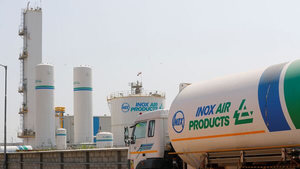 An empty tanker is seen outside an oxygen plant, amidst the spread of the coronavirus disease (COVID-19), in Ghaziabad, on the outskirts of New Delhi, India, April 22, 2021.  - Sputnik International