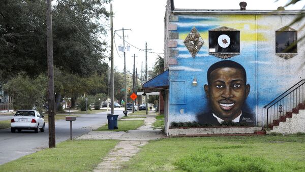  A mural depicts shot Black man Ahmaud Arbery as a Black History Month Memorial Ride is held in memory of those who have died through race-related violence, in Brunswick, Georgia, U.S., February 27, 2021 - Sputnik International