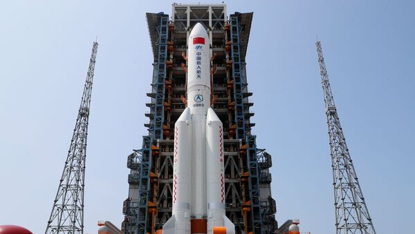The Long March-5B Y2 rocket, carrying the core module of China's space station Tianhe, sits at the launch pad of Wenchang Space Launch Center in Hainan province, China April 23, 2021. - Sputnik International