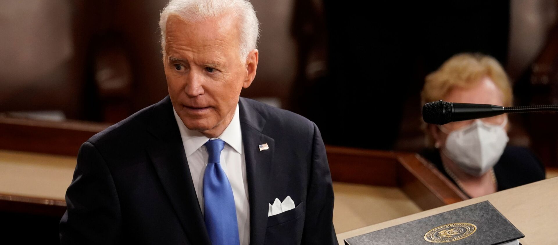 US President Joe Biden turns from the podium after speaking to a joint session of Congress in the House chamber of the US Capitol in Washington, DC, 28 April 2021.  - Sputnik International, 1920, 29.04.2021