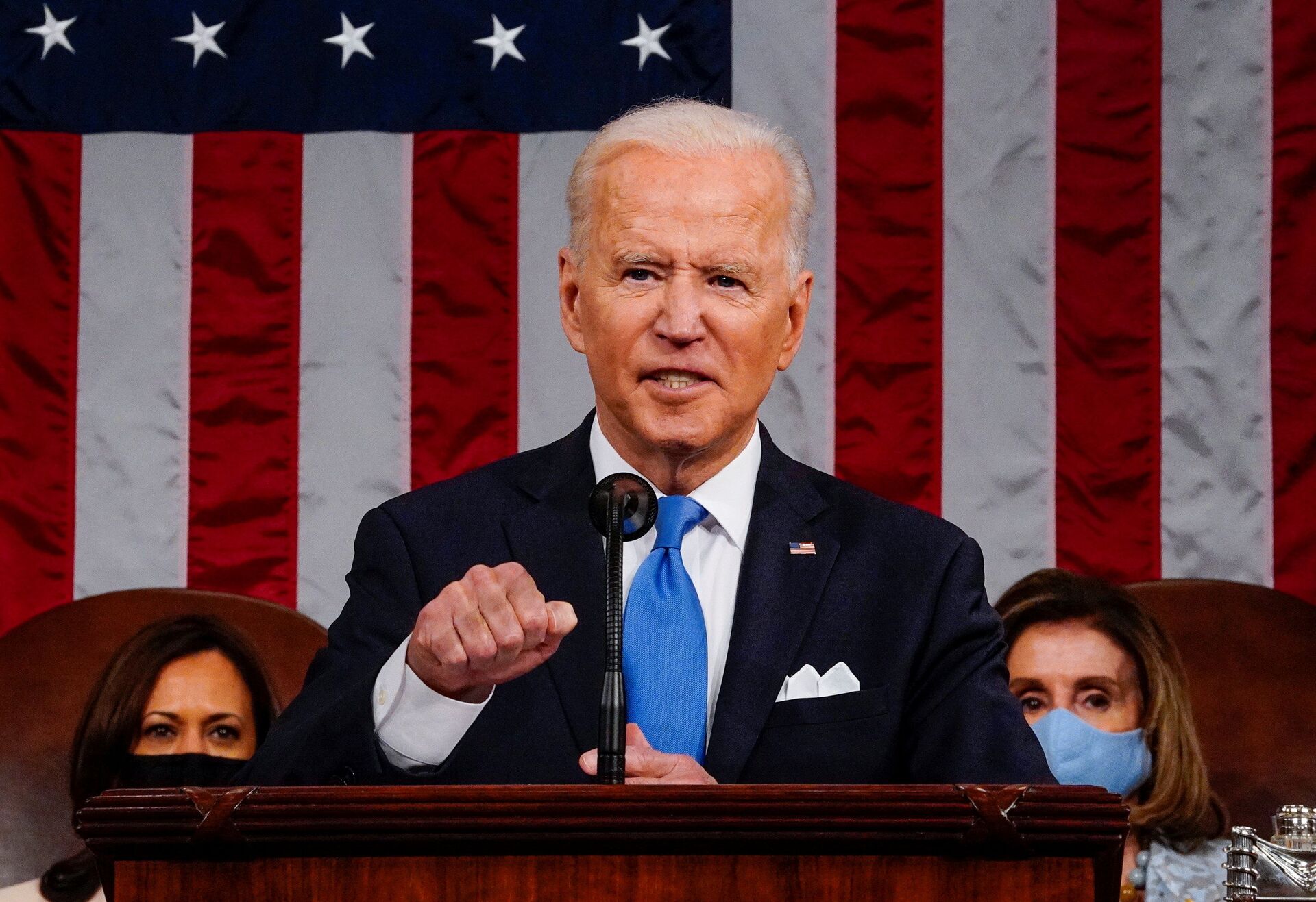 US President Joe Biden addresses to a joint session of Congress in the House chamber of the US Capitol in Washington, US, April 28, 2021 - Sputnik International, 1920, 29.09.2021