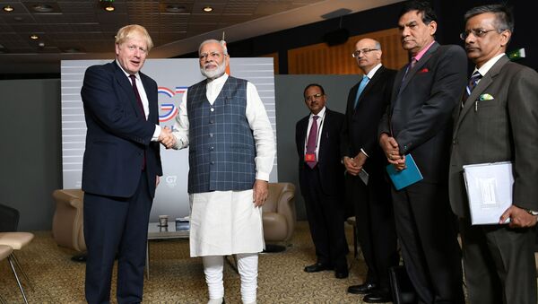FILE PHOTO: Britain's Prime Minister Boris Johnson meets Indian Prime Minister Narendra Modi at a bilateral meeting during the G7 summit in Biarritz, France August 25, 2019. - Sputnik International