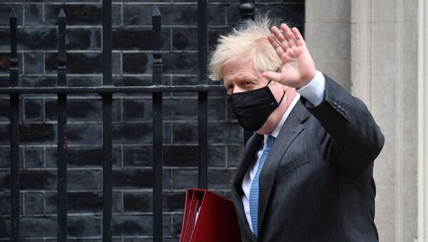 Britain's Prime Minister Boris Johnson leaves 10 Downing Street in central London on April 28, 2021, to take part in the weekly session of Prime Minister's Questions (PMQs) at the House of Commons - Sputnik International