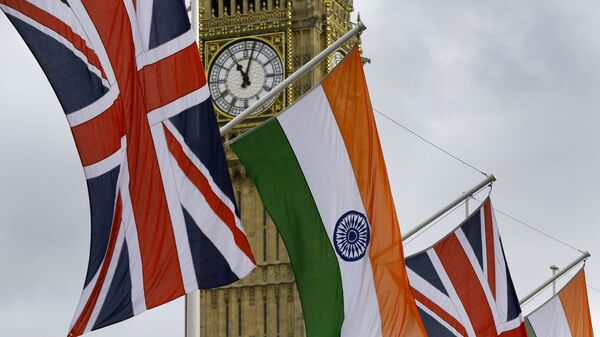 The Union and Indian flags hang near  the London landmark Big Ben  in Parliament Square in London, Thursday, Nov. 12, 2015. - Sputnik International