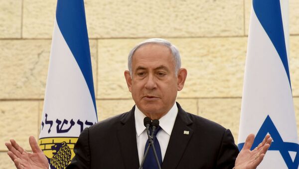 FILE PHOTO: Israeli Prime Minister Benjamin Netanyahu speaks at a ceremony for fallen soldiers of Israel's wars at the Yad Lebanim House on the eve of Memorial Day, in Jerusalem, April 13, 2021.  - Sputnik International