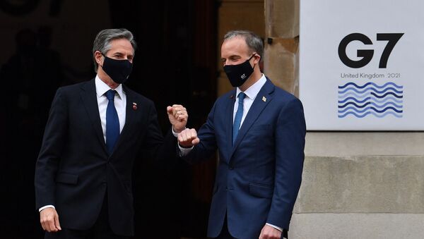 US Secretary of State Antony Blinken (L) is greeted on arrival by Britain's Foreign Secretary Dominic Raab at the start of the G7 foreign ministers meeting in London on May 4, 2021 - Sputnik International