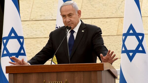 Israeli Prime Minister Benjamin Netanyahu speaks at a ceremony for fallen soldiers of Israel's wars at the Yad Lebanim House on the eve of Memorial Day, in Jerusalem, April 13, 2021 - Sputnik International