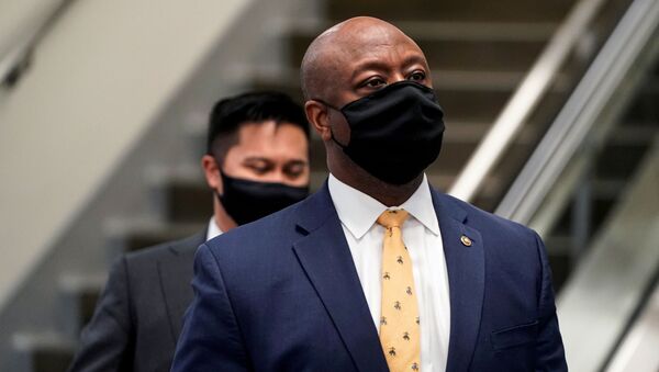 U.S. Senator Tim Scott (R-SC) departs after House impeachment managers rested their case in impeachment trial of former U.S. President Donald Trump, on charges of inciting the deadly attack on the U.S. Capitol, on Capitol Hill in Washington, U.S., February 11, 2021. - Sputnik International