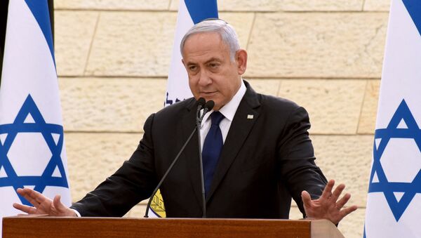  In this file photo taken on April 13, 2021 Israeli Prime Minister Benjamin Netanyahu speaks during a ceremony to mark Yom HaZikaron, Israel's Memorial Day for fallen soldiers, at the Yad LeBanim House in Jerusalem. - Netanyahu's mandate to form a government following an inconclusive election expired on May 5, 2021 giving his rivals a chance to take power and end the divisive premier's record tenure.  - Sputnik International