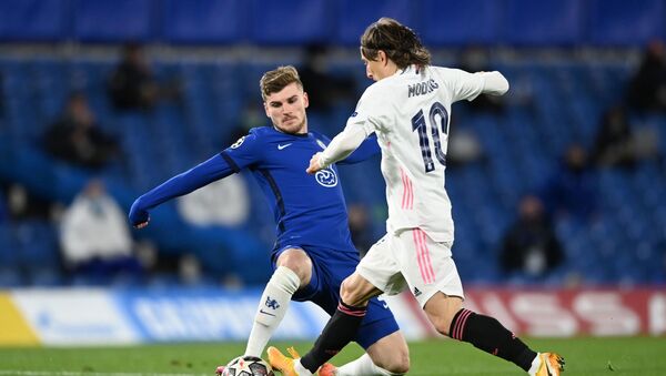 Soccer Football - Champions League - Semi Final Second Leg - Chelsea v Real Madrid - Stamford Bridge, London, Britain - May 5, 2021 Chelsea's Timo Werner in action with Real Madrid's Luka Modric - Sputnik International