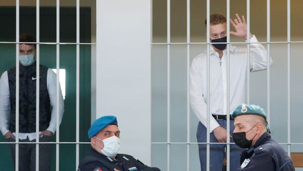 U.S. citizen Finnegan Lee Elder, accused of killing Carabinieri military police officer Mario Cerciello Rega, gestures as he waits next to Gabriel Natale-Hjorth for the start of a hearing as the verdict is expected to be announced, in Rome, Italy May 5, 2021. - Sputnik International