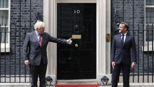 British Prime Minister Boris Johnson, left, meets with French President Emmanuel Macron at 10 Downing Street in London, Thursday, June 18, 2020. The President of the French Republic visits London to celebrate the 80th Anniversary of General de Gaulle's 'Appel' to the French population to resist the German occupation of France during WWII. - Sputnik International