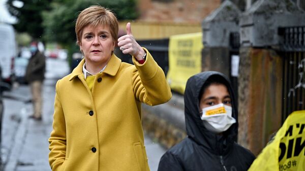 Scotland's First Minister Nicola Sturgeon shows a thumb-up gesture at Annette Street School polling station as Scotland's parliamentary election voting has begun, in Glasgow, Britain, May 6, 2021. - Sputnik International