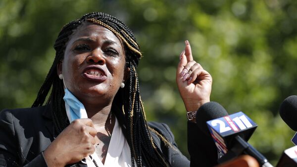 In this Aug. 5, 2020, file photo, Activist Cori Bush speaks during a news conference Wednesday, Aug. 5, 2020, in St. Louis - Sputnik International