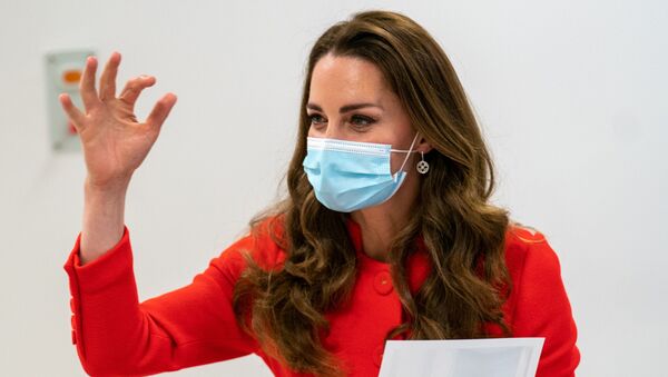 Britain's Catherine, Duchess of Cambridge, gestures during her visit to Royal London Hospital, Whitechapel in Britain May 7, 2021 where she heard about how the hospital uses art to benefit its staff and patients.  - Sputnik International