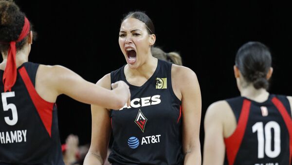  In this Sept. 24, 2019, file photo, Las Vegas Aces' Liz Cambage, center, celebrates after a play against the Washington Mystics during the second half of Game 4 of a WNBA playoff basketball series in Las Vegas - Sputnik International