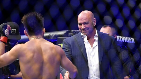 UFC President Dana White (R) congratulates Henry Cejudo (L) of the United States after defeating Dominick Cruz of the United States in their bantamweight title fight during UFC 249 at VyStar Veterans Memorial Arena on May 09, 2020 in Jacksonville, Florida. - Sputnik International