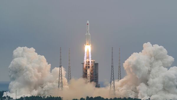 The Long March-5B Y2 rocket, carrying the core module of China's space station Tianhe, takes off from Wenchang Space Launch Center in Hainan province, China April 29, 2021 - Sputnik International