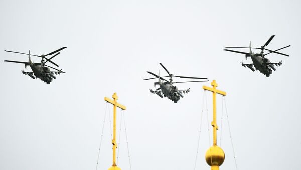 Ka-52 coaxial rotor attack helicopters flying over Red Square - Sputnik International