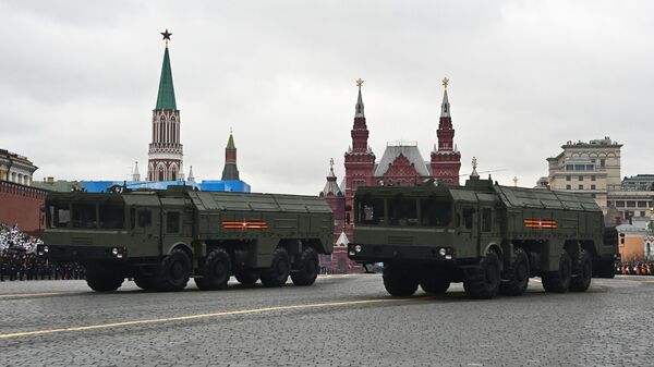 Iskander-M tactical missile systems belonging to the 12th Guards Rocket Brigade at 9 May parade on Red Square - Sputnik International