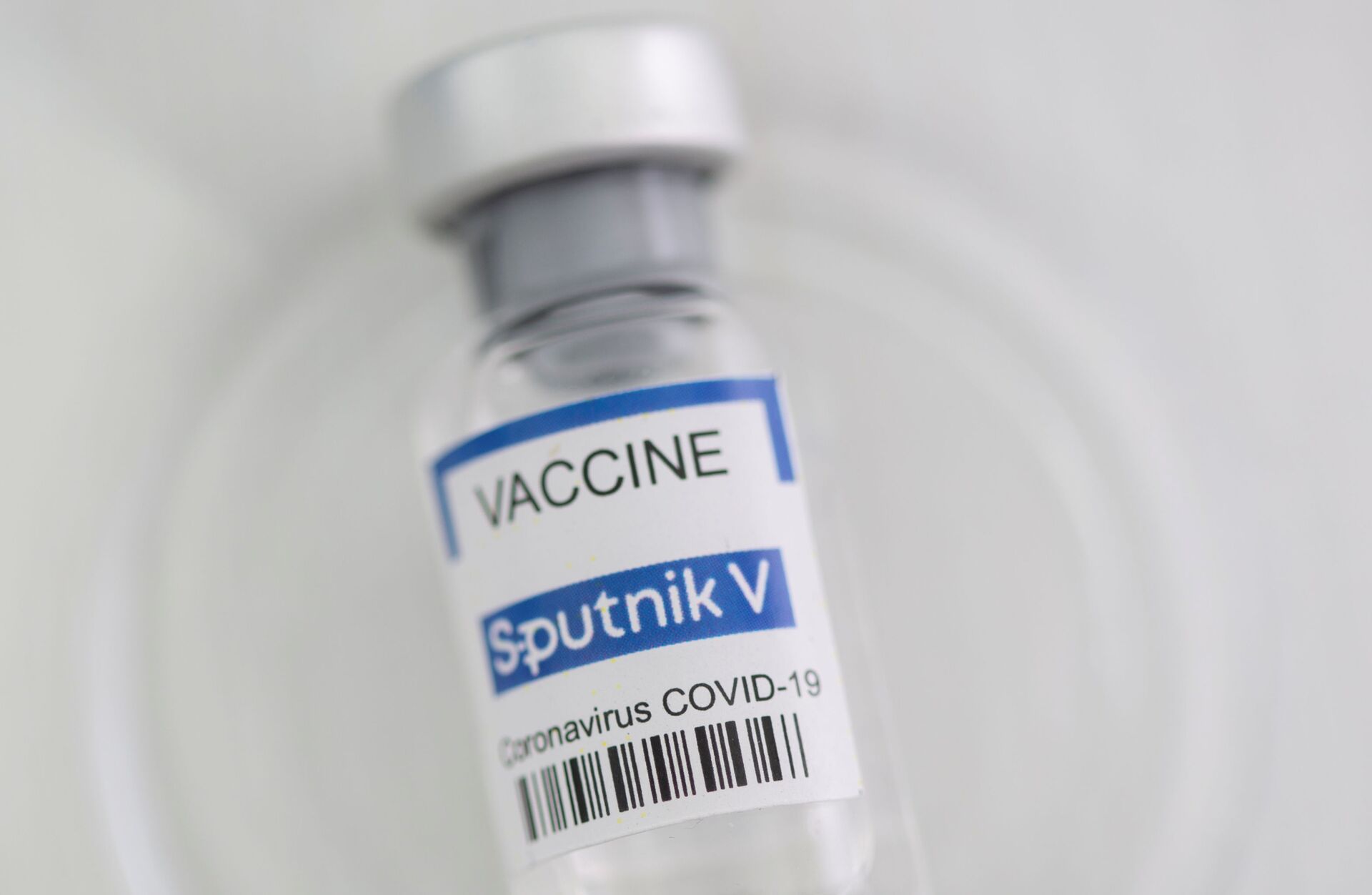 A vial labelled Sputnik V coronavirus disease (COVID-19) vaccine is seen in this illustration picture taken on 2 May 2021. - Sputnik International, 1920, 07.09.2021
