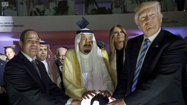 In this image from 21 May 2017, US President Donald Trump, Egyptian President Abdel Fattah el-Sisi, and Saudi King Salman, grasp an orb during a forum in Riyadh. - Sputnik International