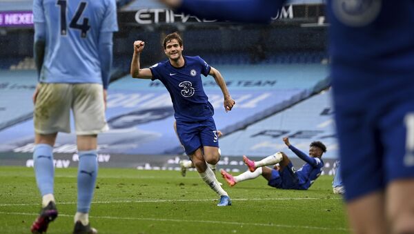 Chelsea's Marcos Alonso celebrates after scoring the winner in Premier League match against Manchester City in May 2021. - Sputnik International