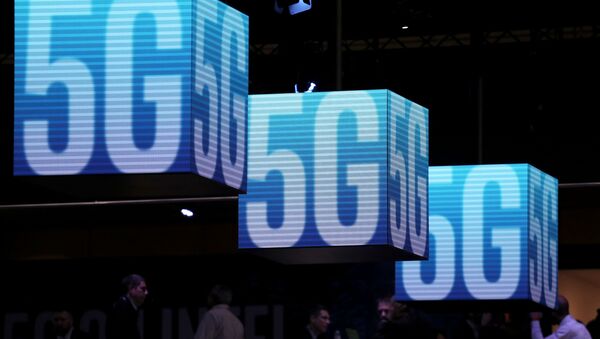 Hanging cubes display 5G logos at the Mobile World Congress in Barcelona, Spain, February 26, 2019. REUTERS/Sergio Perez/File Photo - Sputnik International