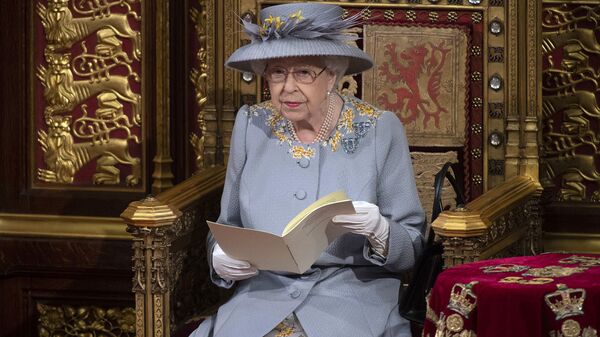 Britain's Queen Elizabeth II delivers the speech in the House of Lords during the State Opening of Parliament at the Palace of Westminster in London, Tuesday May 11, 2021. (Eddie Mulholland/Pool via AP) - Sputnik International