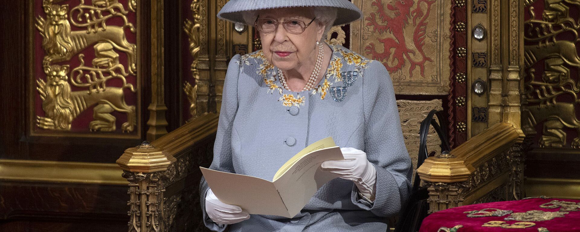 Britain's Queen Elizabeth II delivers the speech in the House of Lords during the State Opening of Parliament at the Palace of Westminster in London, Tuesday May 11, 2021. (Eddie Mulholland/Pool via AP) - Sputnik International, 1920, 11.05.2021